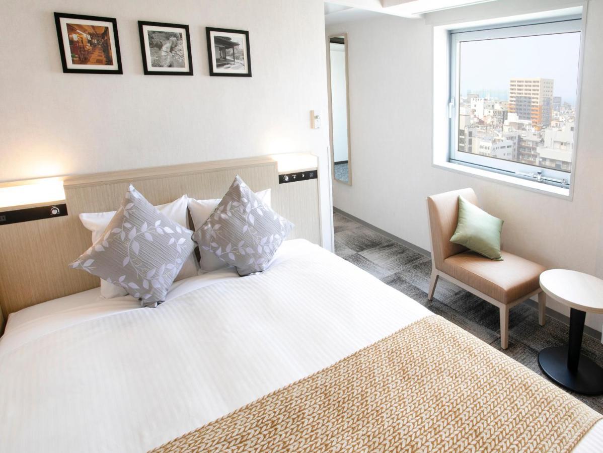 Art Hotel Оита Экстерьер фото