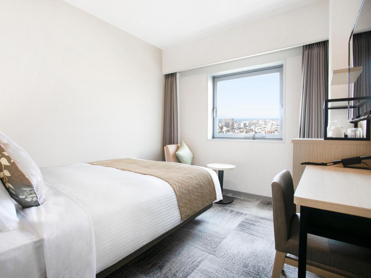 Art Hotel Оита Экстерьер фото